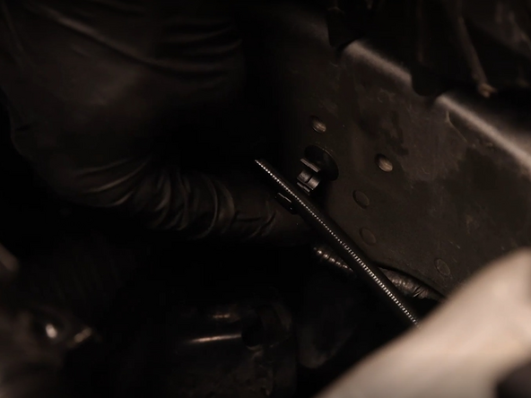 Install the line into the clips you installed on the frame in step 14.