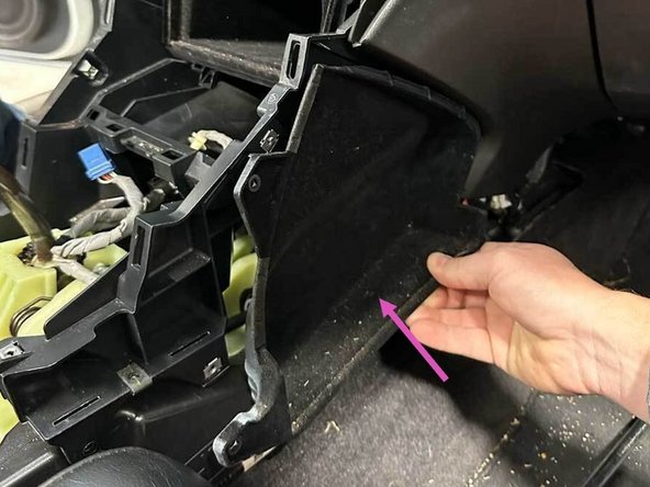 Gently pull the pocket out.