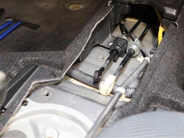 Remove the shifter assembly from the car.