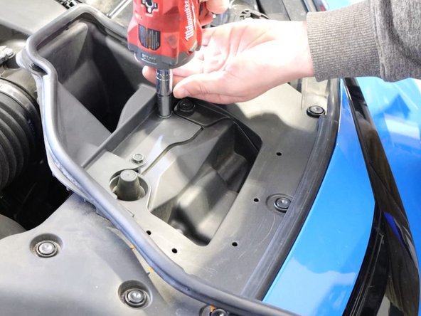 Begin in the engine bay by removing the air intake seal. You will need to remove the airbox lid so remove this section to make gaining access to the tray easier.