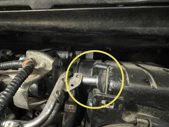 Then lightly pull towards drivers side (US).