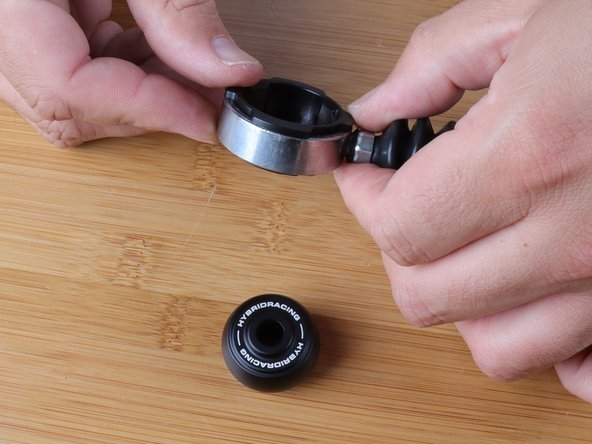 Slide the ring into place and make sure you hear it snap.