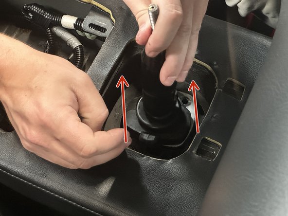 Once you have removed all three bolts you can lift the shifter upwards and remove it from the car.