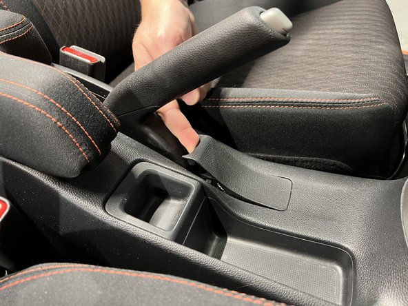 Remove the console cover.