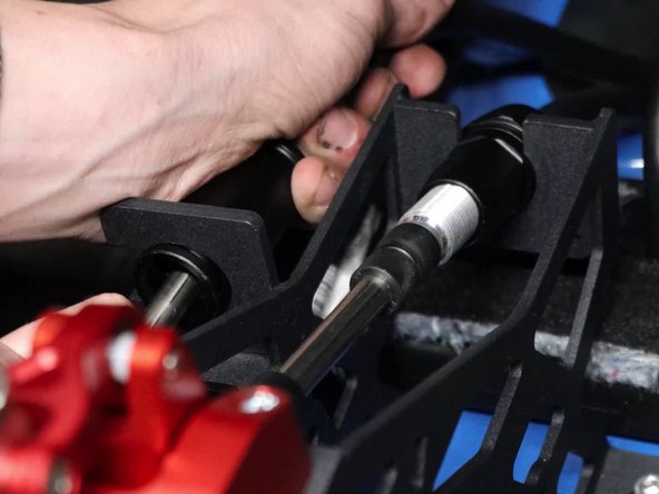 Insert the shifter cables back into the shifter.