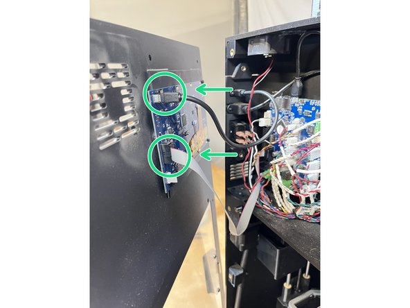 Plug the two front panel wires into the appropriate connectors on the back of the display.