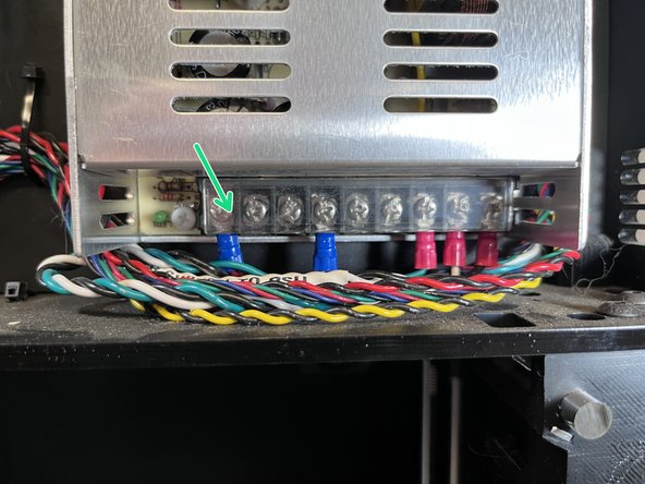 Close the clear plastic cover over the power supply wire terminals.