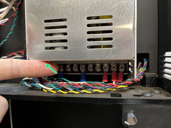 Lift the plastic cover that protects the wire terminals.