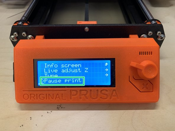 To pause a print due to failure or other issue, press the knob on the front of the display and scroll down to Pause print by turning the knob.  Press the knob again to select pause.