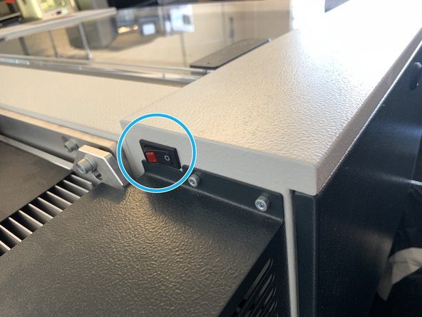 The machine will go through an initialization procedure which involves the cutting table moving to the bottom of the machine and the cutting head will go through a series of motions before stopping.