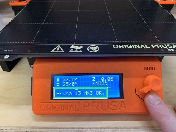 If you are unsure of which model printer you will be using for printing, you can find out by pressing the reset button  (located below the dial) on the display face, and then read the model name at the bottom of the LCD display.