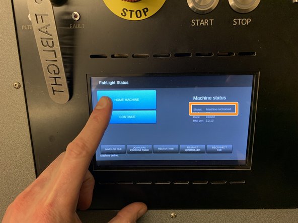 The machine will take up to a minute to initialize, and the main option buttons on the touch screen display will turn from grey to blue.