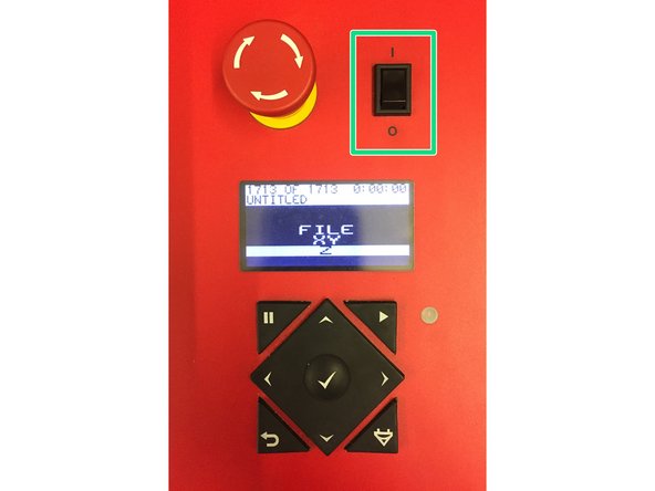 Flip the small, black switch next to the machine main keypad.