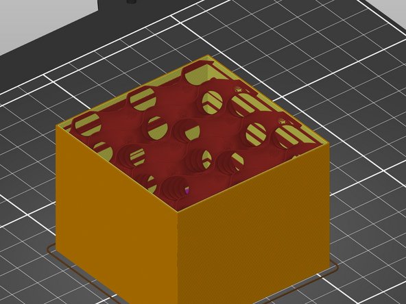 Expand the Infill dropdown menu on the right side of the screen, and select a percent value.  The two examples pictured in this guide are 5% (more sparse) and 70% (more dense).  For scale, the cube pictured is just under two inches square.