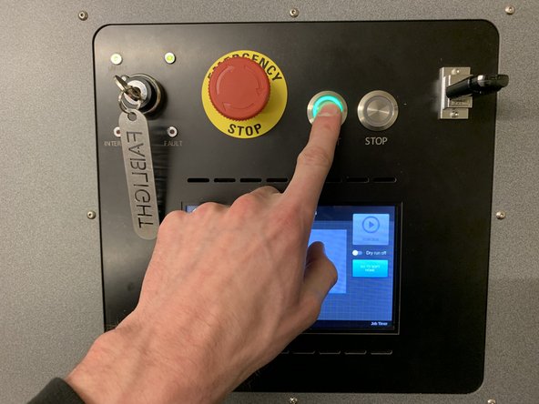In the top right corner of the display screen, press the RUN JOB button.