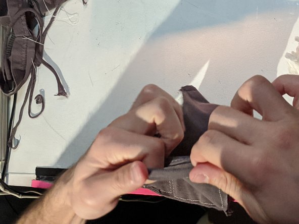 Flip the mask inside out and trim up any loose fabric that might irritate your face.