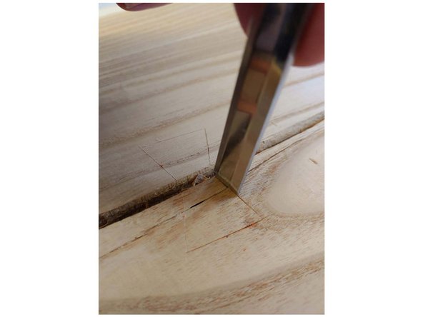 Work all the way around the perimeter until you have outlined the entire cut with the chisels
