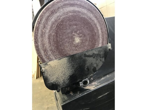 There is a guard on the lower half of the disc.