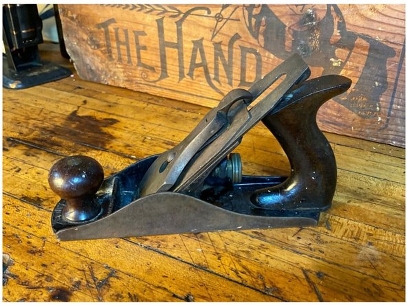 The plane above is currently listed at $22.50 on eBay, from the picture on the left we can see it is a Stanley Bailey. The top cap doesn’t have the Stanley name on it so if the top cap belongs to the plane it’s an older vintage, and since there is one patent number on the lever we know it is old, so we can assume it's from 1899-1902 which is good.