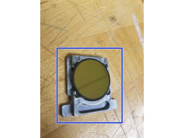 Starting from the top  of the mirror, use downward motions with the Q-tip to clean the dirt off the mirror. If you have ever painted before, it's like  brush strokes.