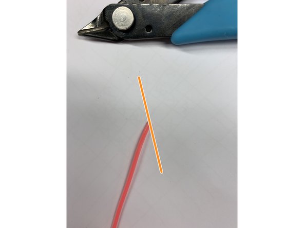 Remove tape from filament.