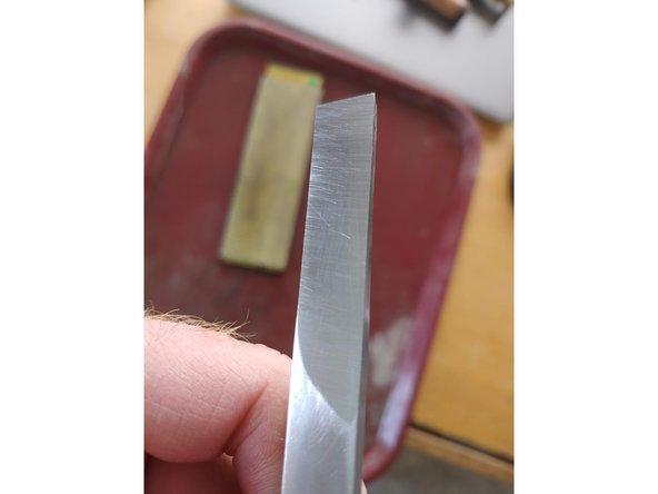 Don’t get to discouraged, this chisel took me about 40 minutes to get through the first grit... but I will never have to do it again. Rinse the blade and stone between grits to prevent transfer.