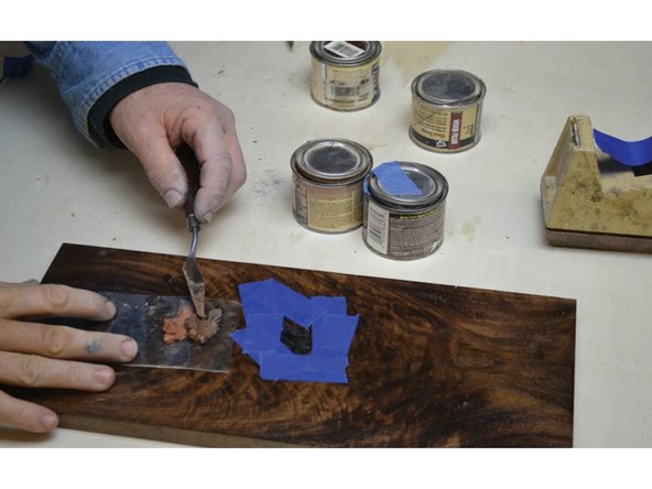 Wood putties are used to fill mid sized problems in woods, they are similar to wood filler except that they use wood dust as the bulk agent. Epoxies can be used to fill large problems such as knots, cracks and checking. Just beware that they will never match the wood perfectly, this is more of a Wabi-Sabi approach.