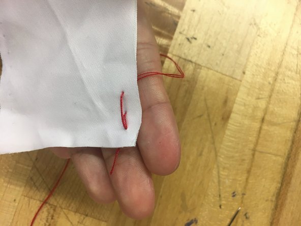 However, after pushing the needle through the second time do not make another cm stitch.