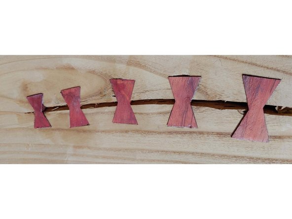 Prevent a crack from spreading, or highlight a flaw in the wood (Wabi-Sabi). This floating shelf is made from Russian olive with Padauk highlights