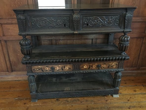 A piece of furniture can be around as long as someone is able and willing to take care of it, or it is preserved in some way. The oldest piece of furniture known is a inlaid table from the tomb of King Midas, it dates to 696 BC. It was most likely finished in a dissolved copal resin (essentially varnish).