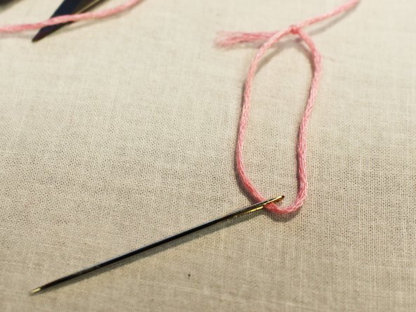 Note: longer pieces of thread can often get tangled and knotted, start off with a shorter piece of thread - you can always add more later