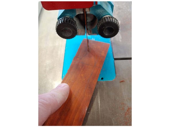 The bandsaw is the easiest tool for this, make sure the blade is square to the pattern using the square. It will make the remaining steps a lot quicker. You could also cut these out by hand with a back saw.