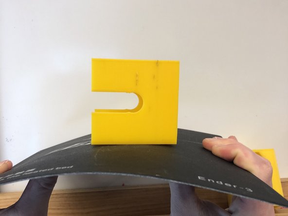 Flex the bed to release part from the bed surface