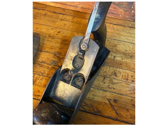 What we can see of the machining is that it is fully machined. The handles look to be in good condition without cracks. There is a little rust on the base, but its only surface rust. This plane looks like it could be bought and made to use with very little effort. I would absolutely get it and use it.