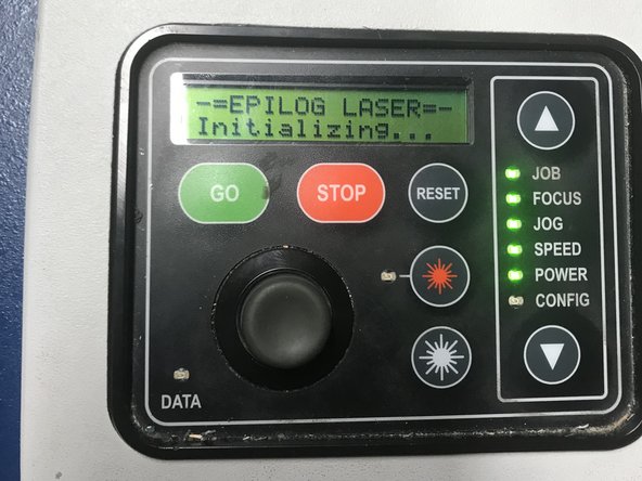 Turn the laser on by flipping the power switch from the left to the right.