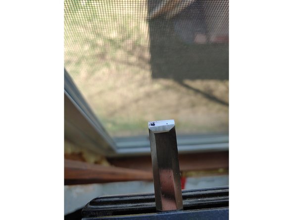 Set the bevel angle in the jig. Do this by gently tightening the jig on the blade, then put it on the lapping plate or a stone. Move the blade back and forth until the bevel sits flat on the plate. Make a few passes on your coarse stone and inspect the scratch pattern to determine if further adjustments need to be made.  (images 1 and 2)