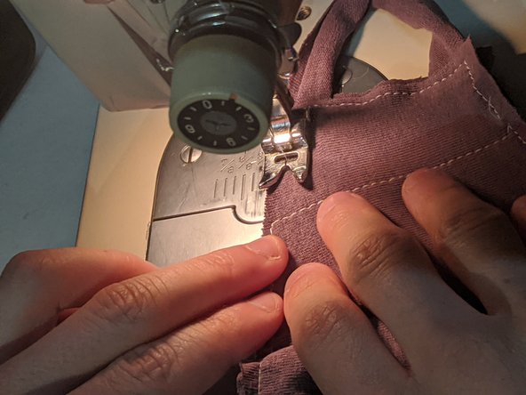 You should have a box shape now. Cut the strands and tie them.