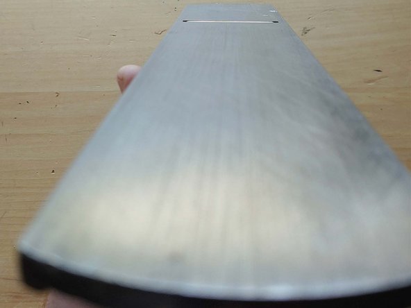 Hold the plane upside down in raking light, adjust the depth screw until you can barely see a glint of the polished blade coming through, adjust the lever until the iron appears flat to the bottom of the plane, then pull the blade back into the plane 1/4 turn.