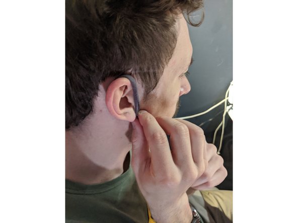 Cut it into two strips and measure the length around your ears and cut them to that length.