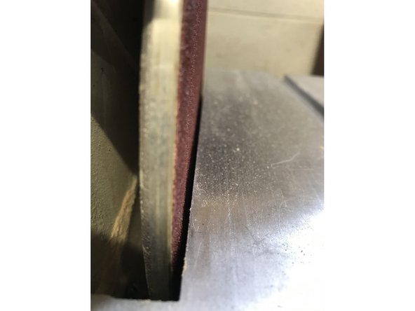 Put the table back, and retighten the screw with the 6mm hex key.