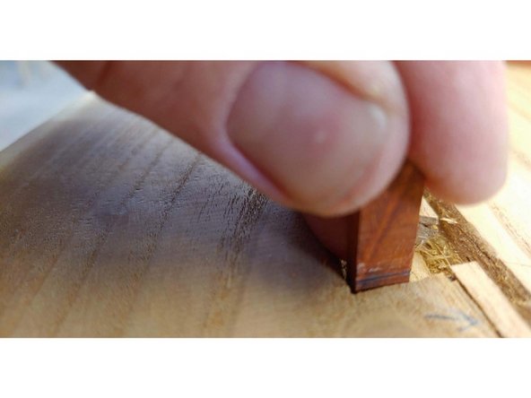 You will want the butterfly to be just proud of the surface, if the butterfly gets inserted below the surface you will have to sand all that material to make it flush.