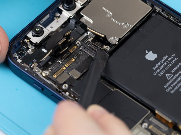 Using a spudger or your fingernail, disconnect the 0.5x rear camera flex.