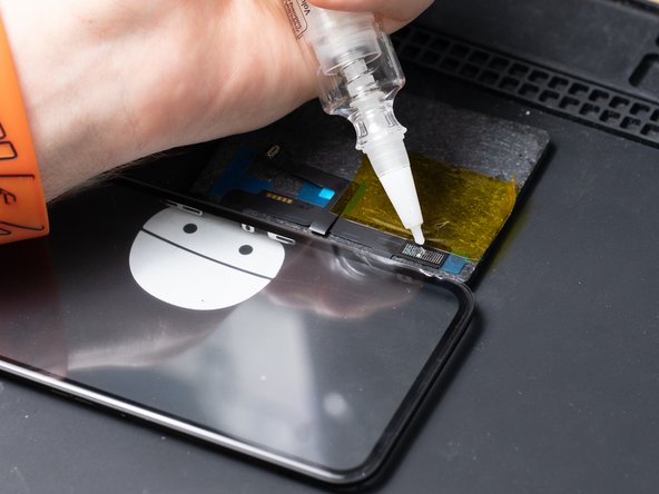 Add some flux to the digitizer and spread it out onto all the solder joints.