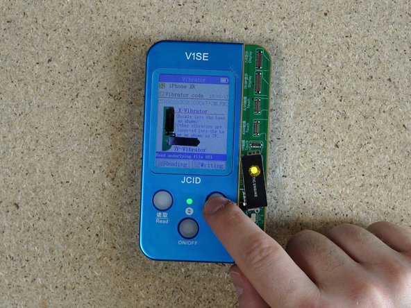 Attach the aftermarket taptic engine and click writing. Once complete, unattach  the taptic engine.