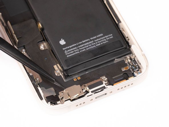 Using tweezers, pull the protective cover away. The cover is stuck down with an adhesive so you'll need to be firm when removing it.