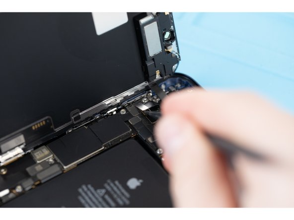 Disconnect the front sensor assembly cable connector with a spudger or your fingernail.