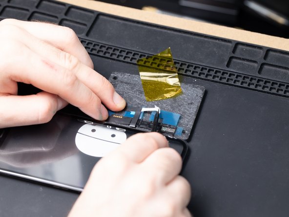 You'll need to re-apply the Kapton tape after removing the blue films and adhesive.