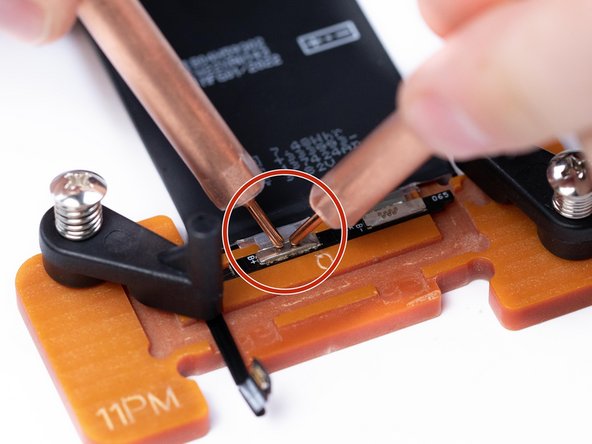 The second image is how you should not be holding them. They are far too close, holding them too close can give unexpected results.