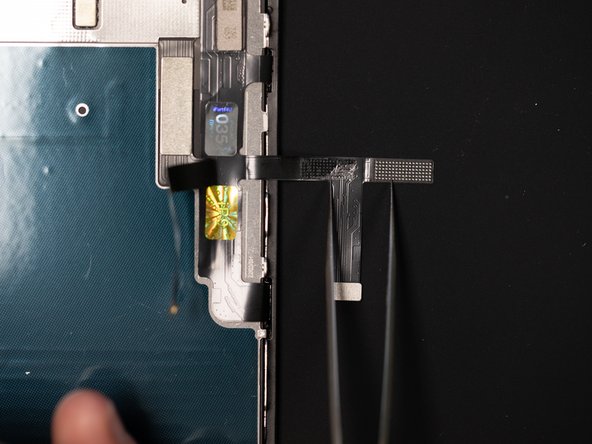Unfold the section of the flex where you'll be applying the original IC chip.