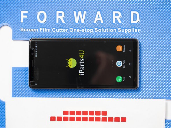 Apply a peelable tab to one of the bottom corners of the front film. This will allow you to peel off the final protective layer sitting on top of the film.